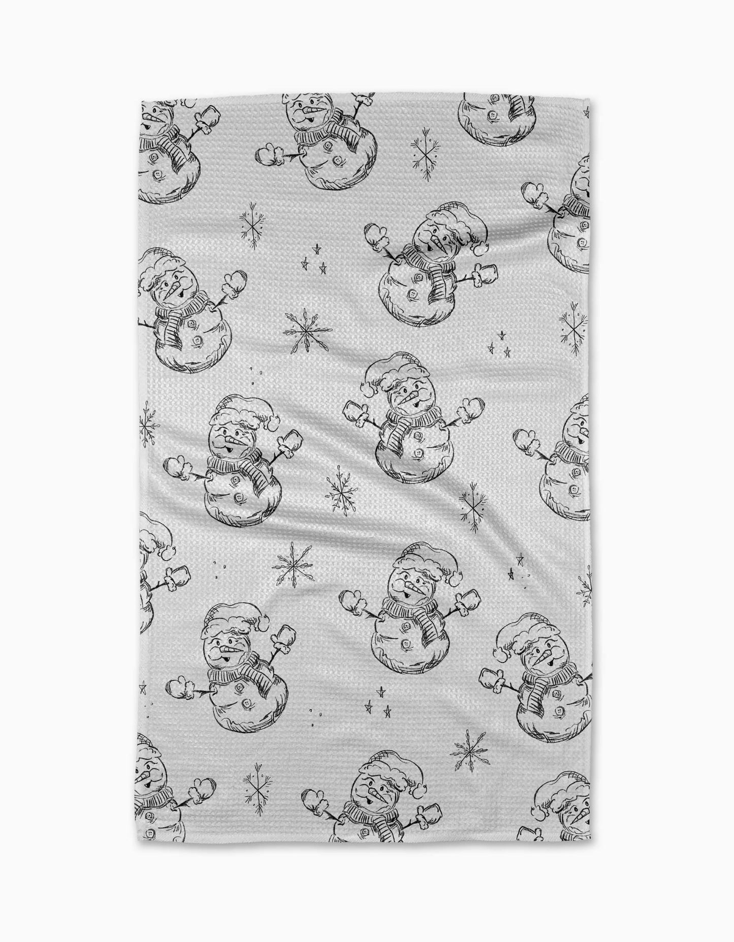 Geometry Tea Towel Patterned fabric with snowmen and snowflakes on a gray background