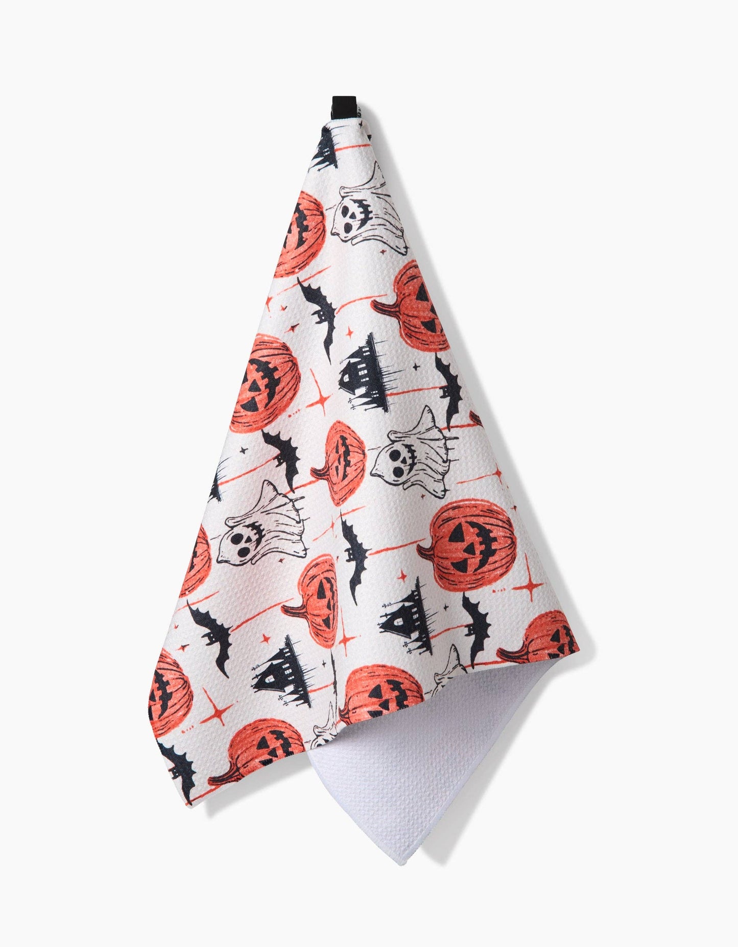 Halloween-themed towel with pumpkins, ghosts, and bats on a white background