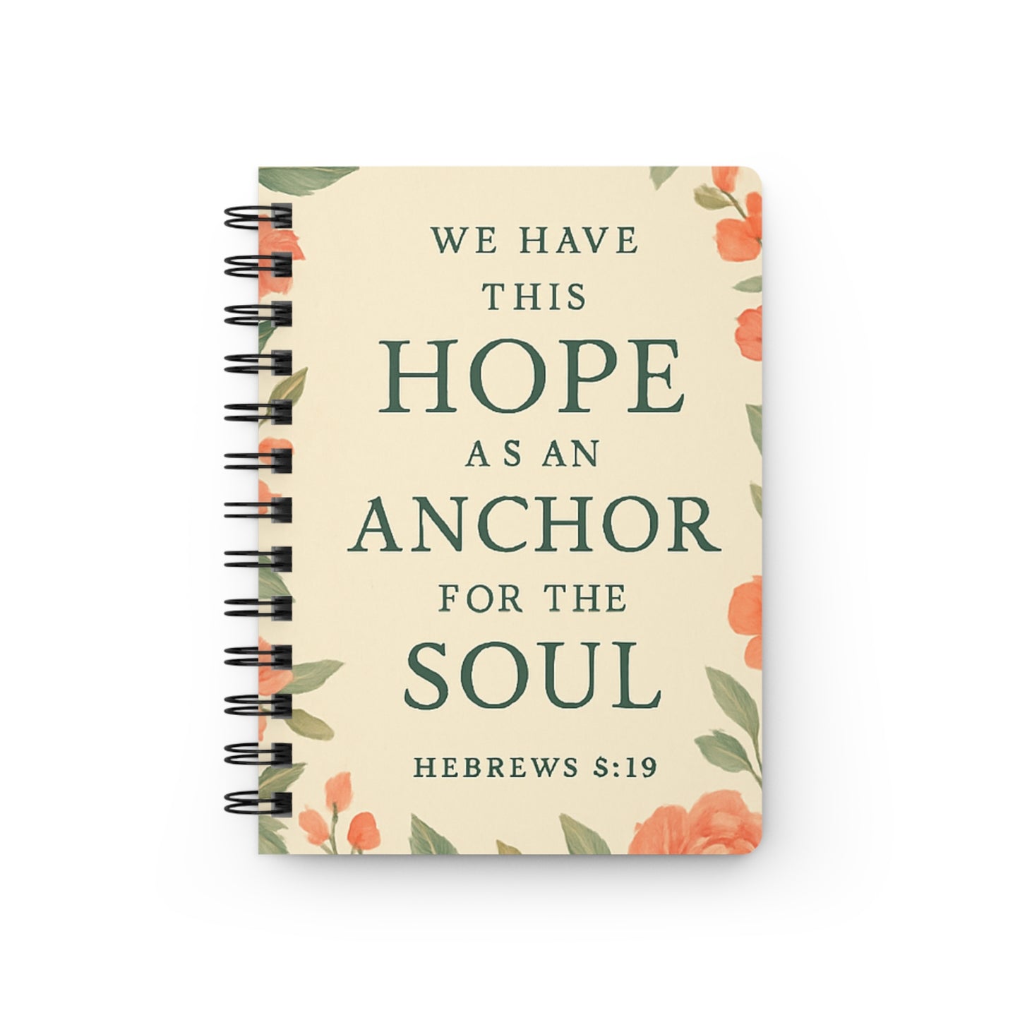 Notebook with floral design and inspirational quote on a white background