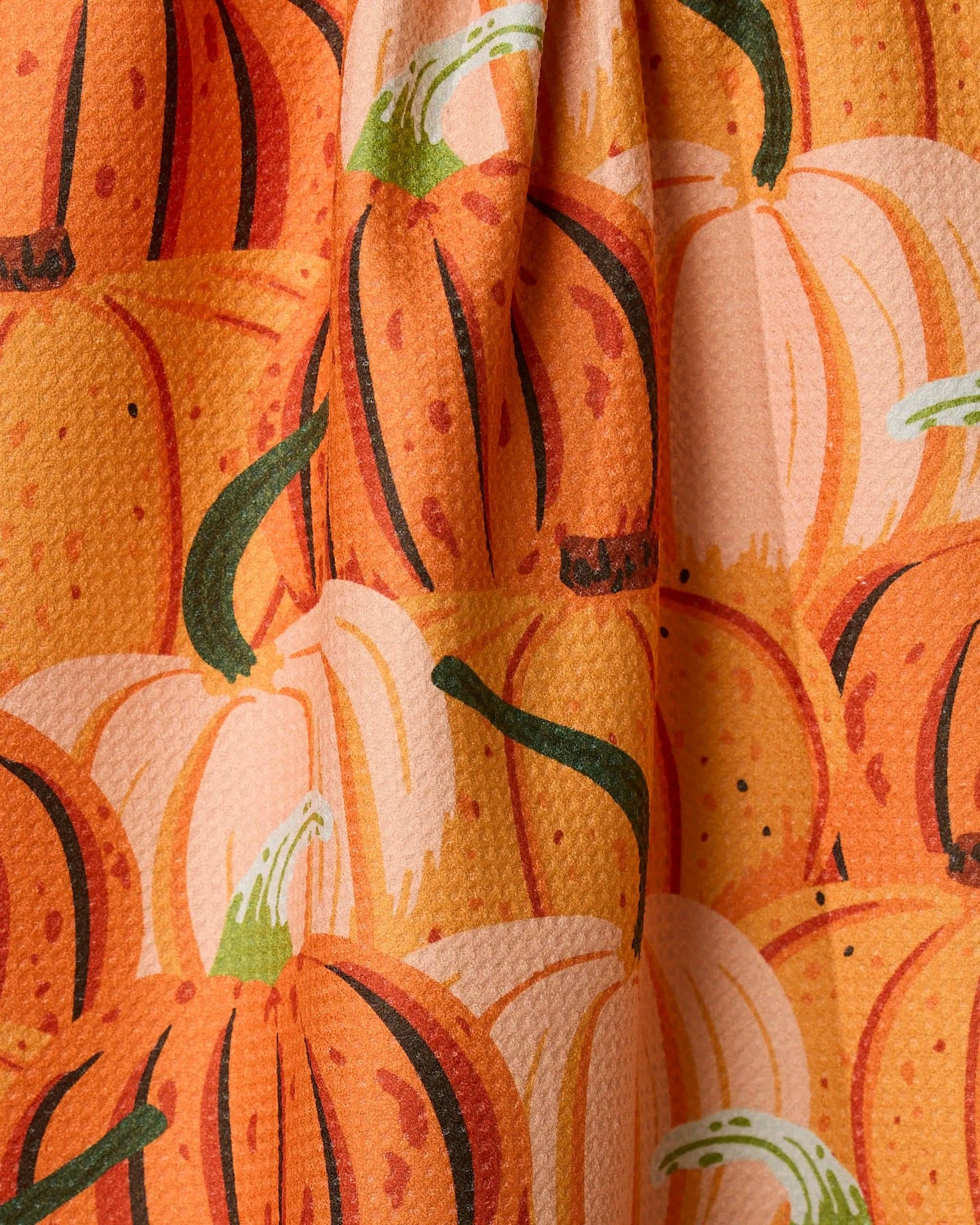 Geometry brand kitchen tea towel pattern of pumpkins on a fabric background