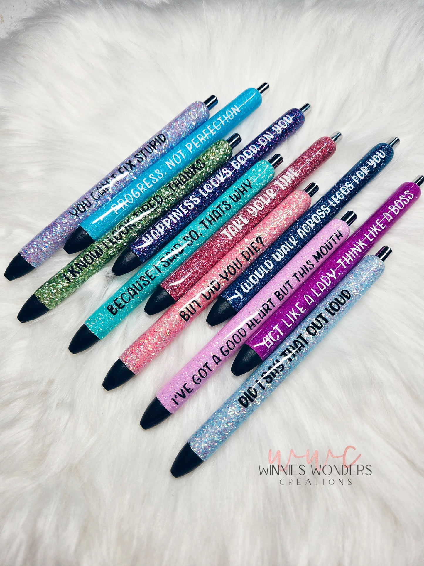 Set of glittery pens with motivational text on a white surface Winnies Wonders Creations
