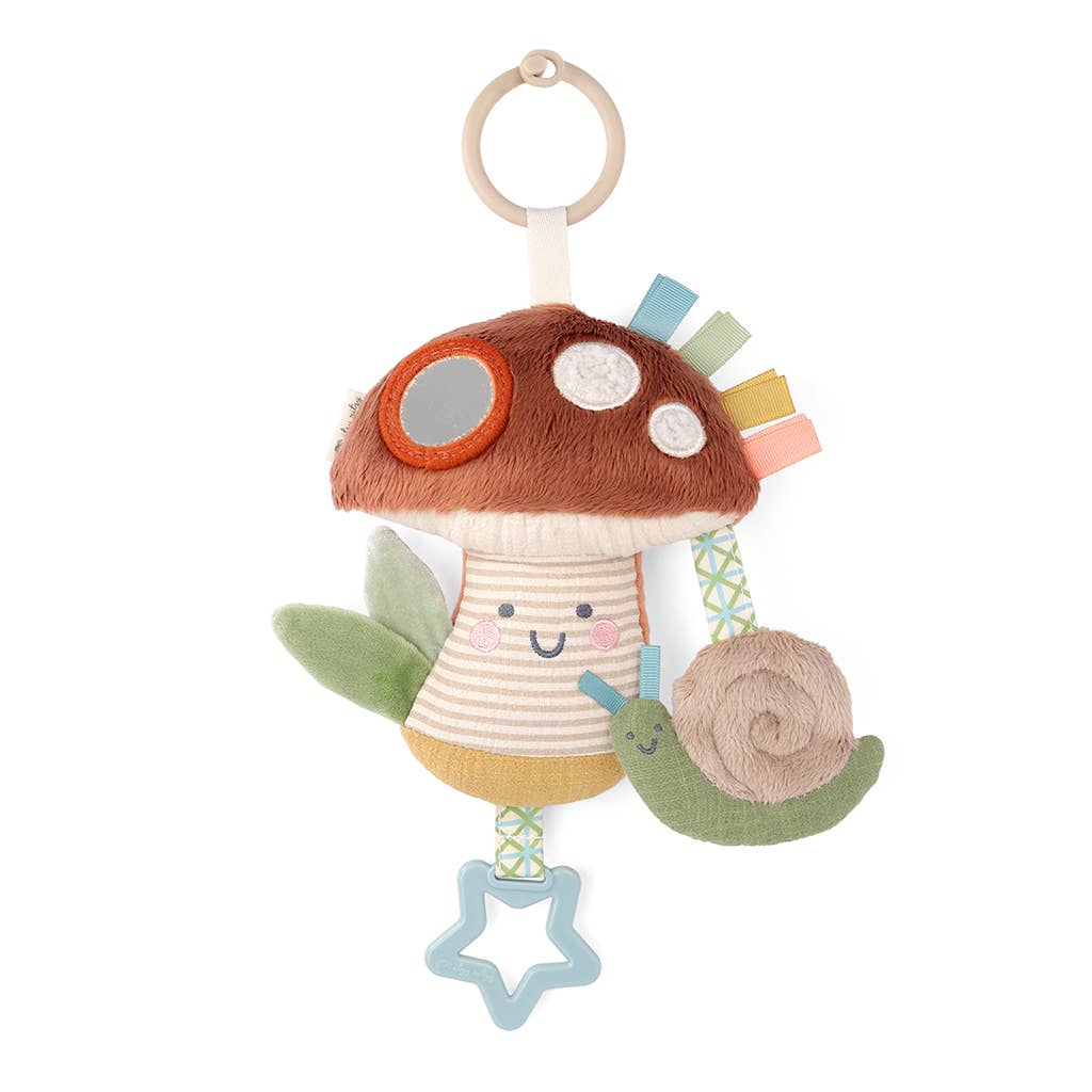Children's plush toy with a mushroom design on a white background