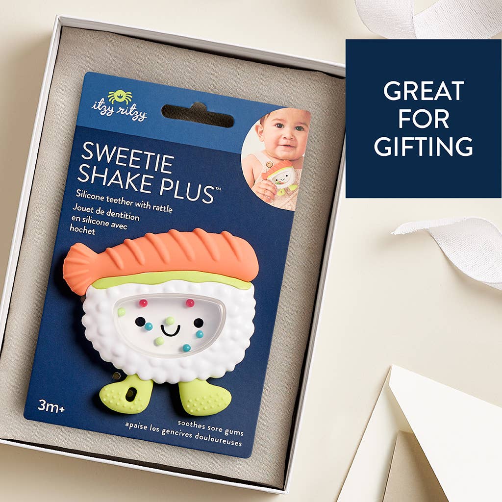 Silicone teether packaging with branding and product details, placed in a box.