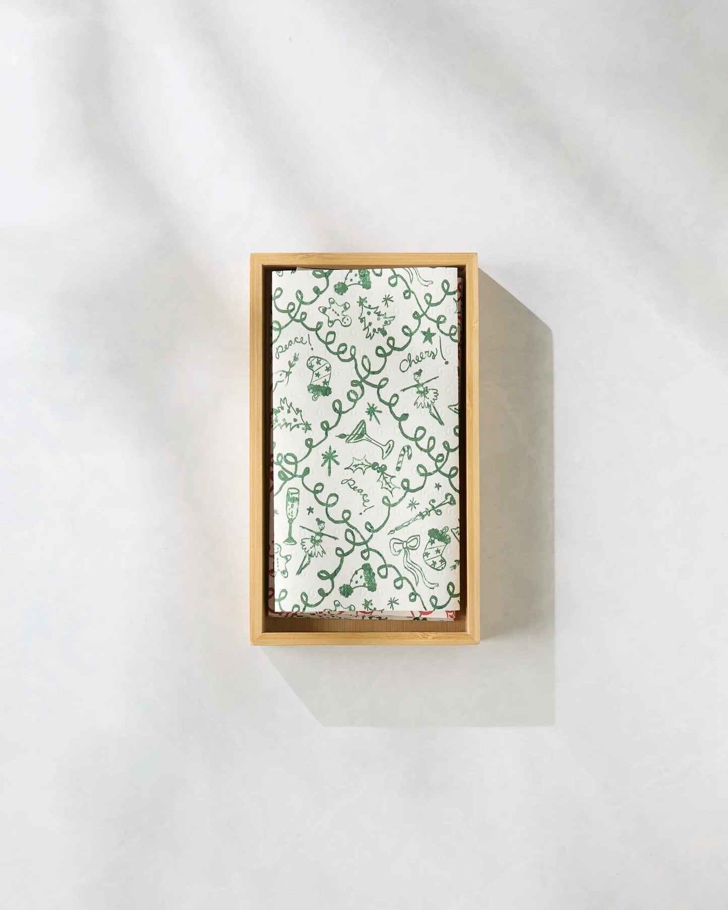 Set of three patterned Geometry Not Paper Towels stacked on a white background