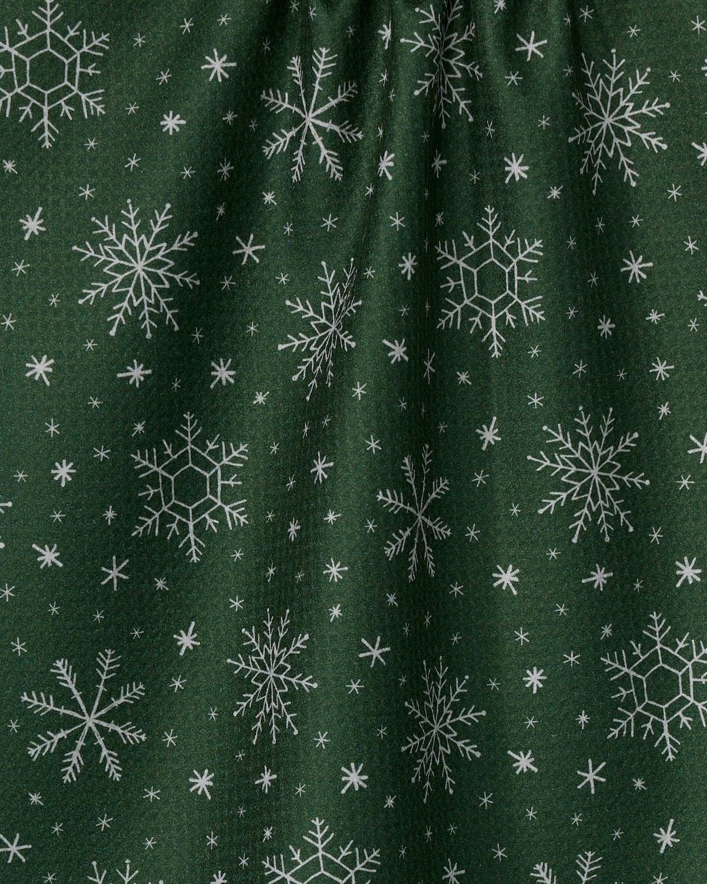 Geometry Tea Towel Green fabric with snowflake pattern