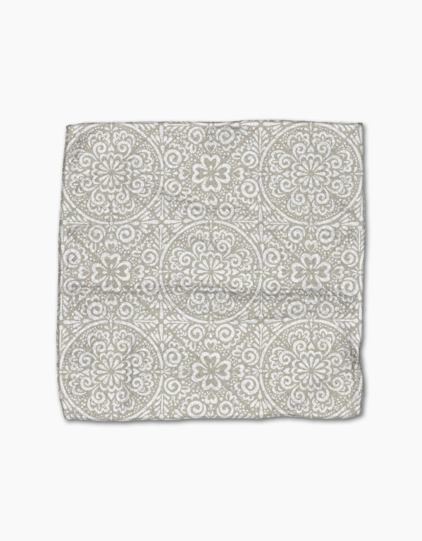 Patterned fabric square on a white background