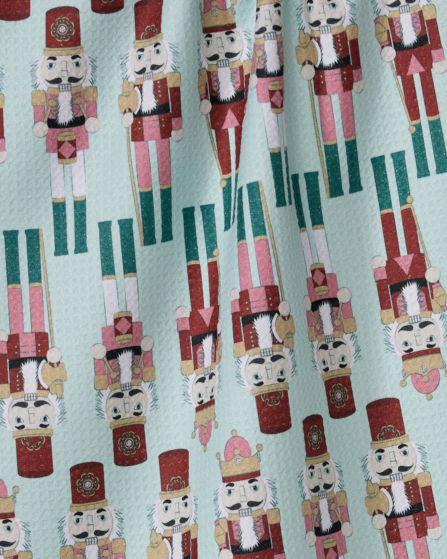 Geometry Tea Towel Pattern of nutcrackers on a light blue background