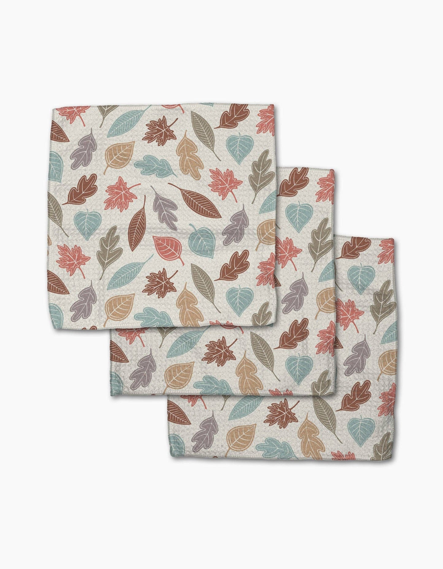 Set of three fall themed dishcloths with leaf pattern on a white background Geometry Brand