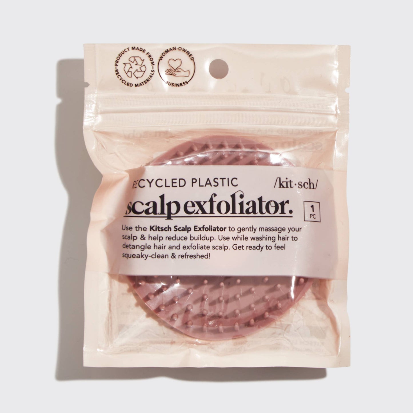 Package of a scalp exfoliator with text on a white background