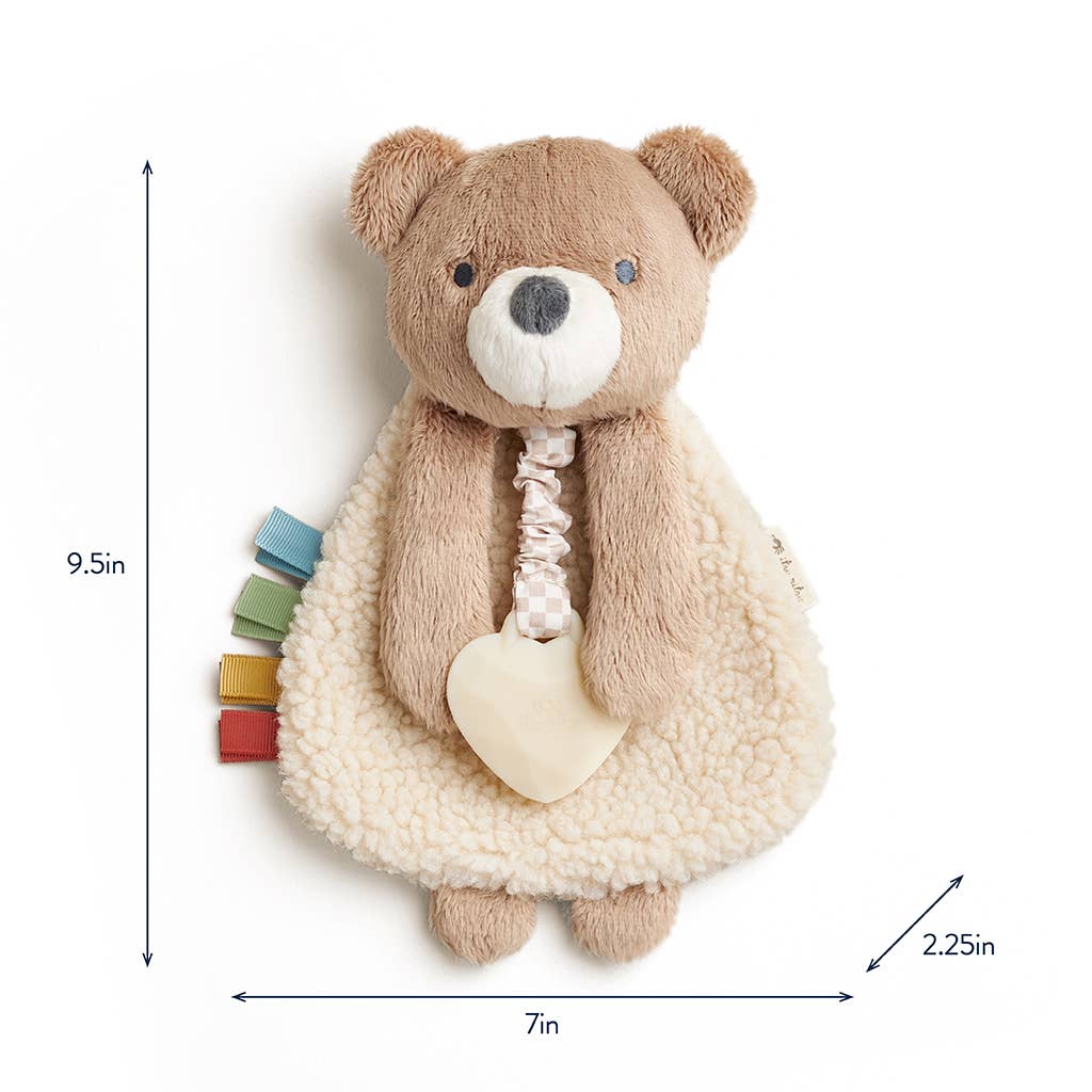 Plush teddy bear with measurements on a white background