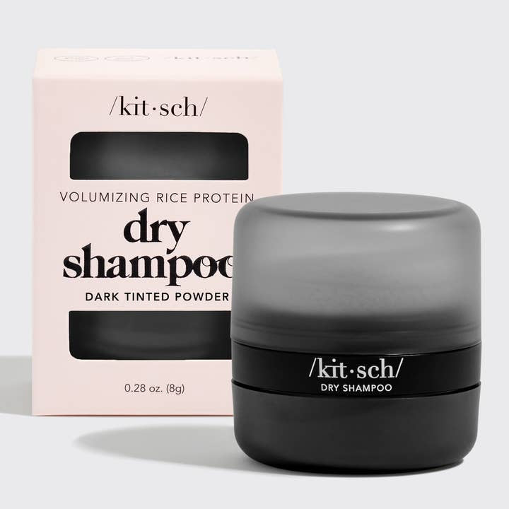 Kit'sch dry shampoo with packaging on a light gray background