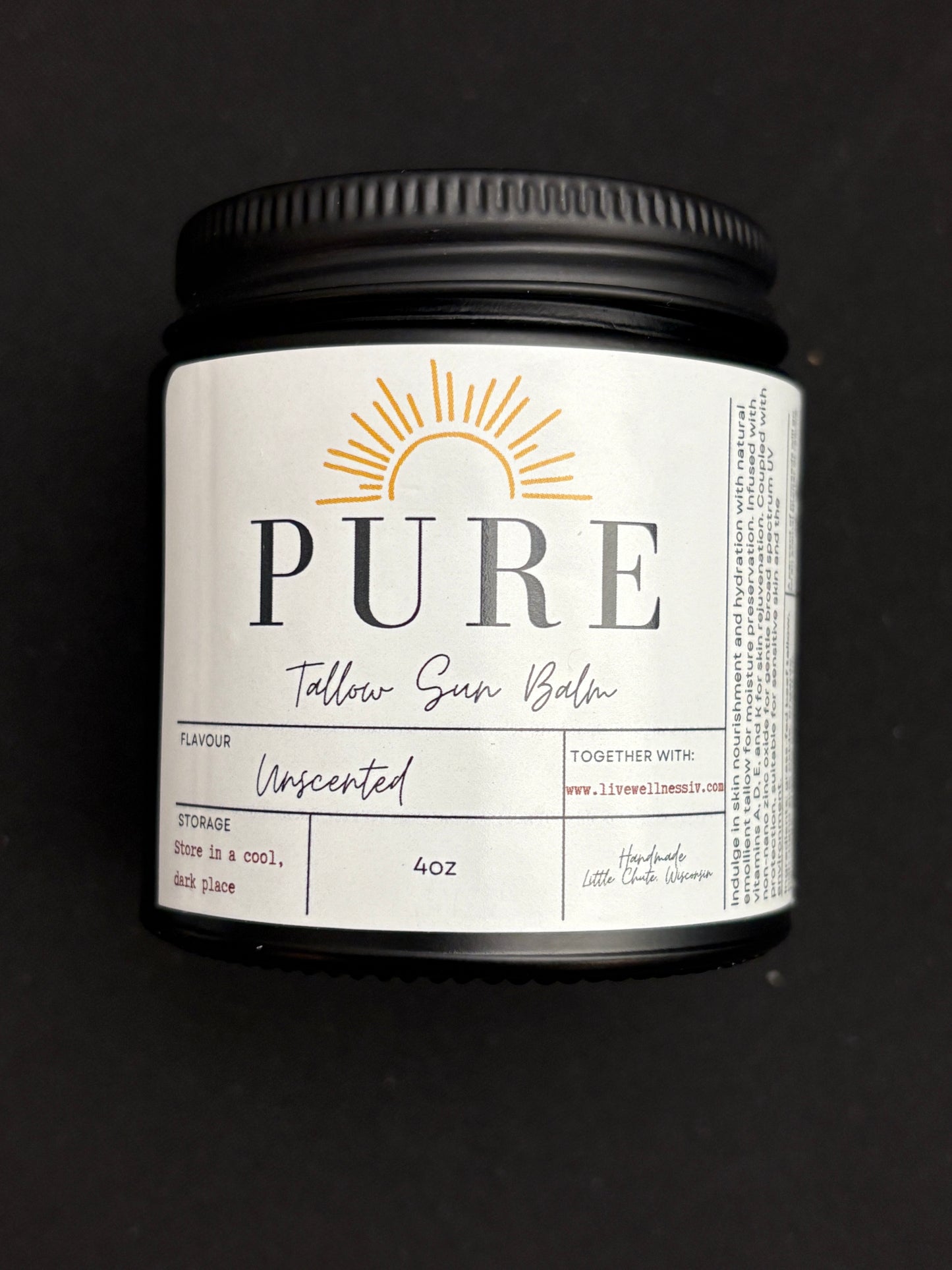 A jar of Pure Tallow Sun Balm Unscented 4 oz with a white label that includes a sun graphic and product details.