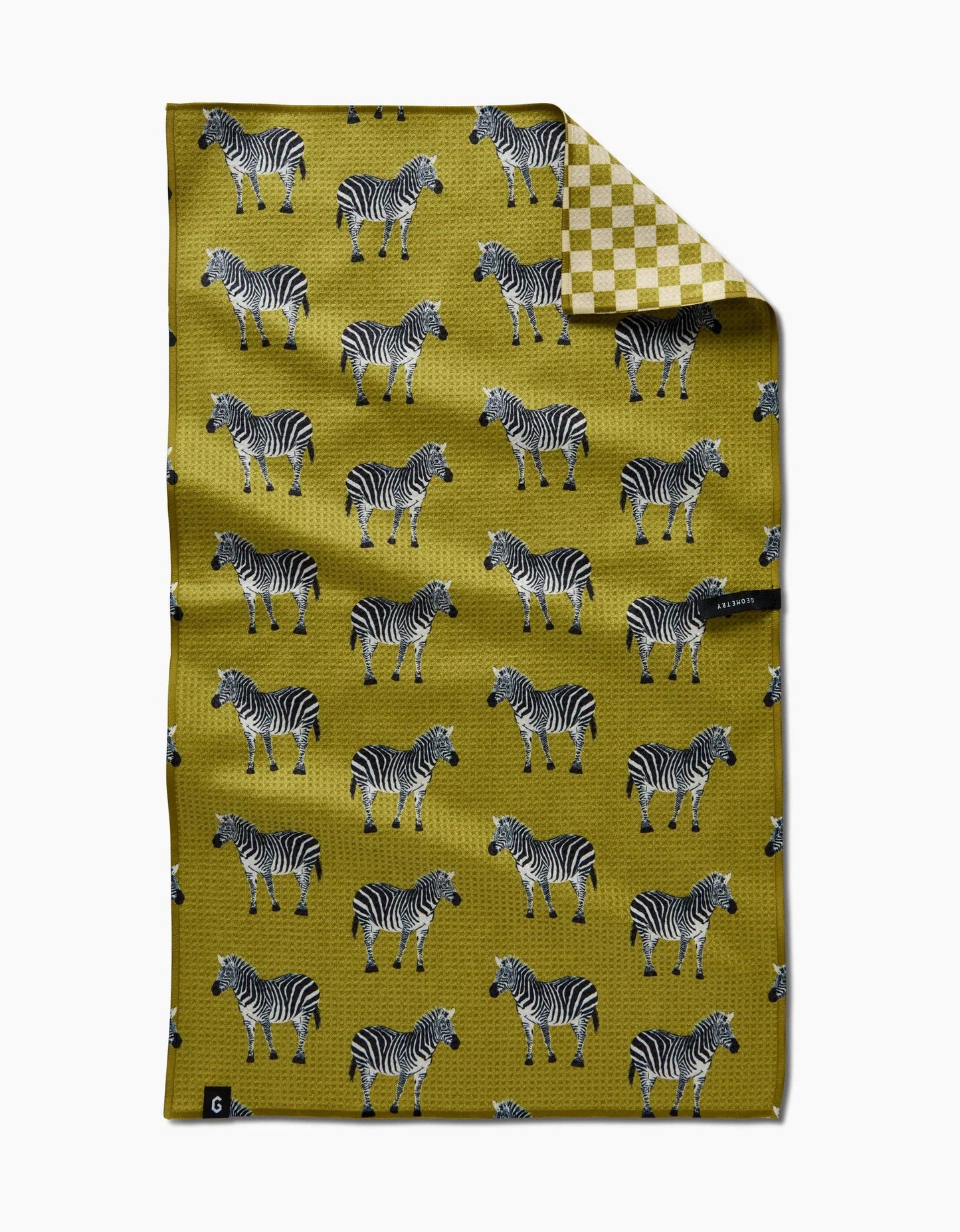 Folded fabric with zebra pattern on a yellow background