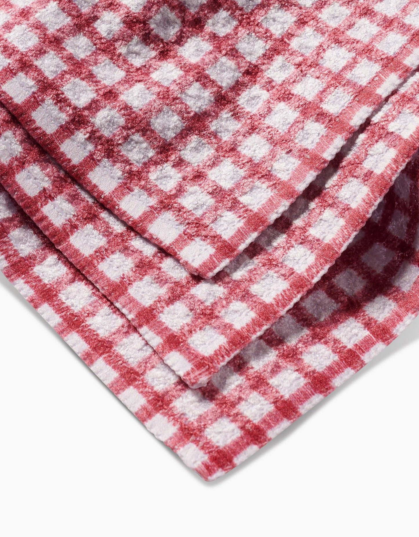 Red and white checkered fabric on a white background