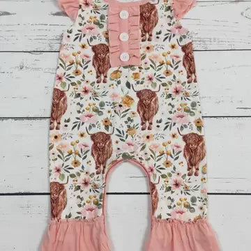 Cow Flower Romper on wood background