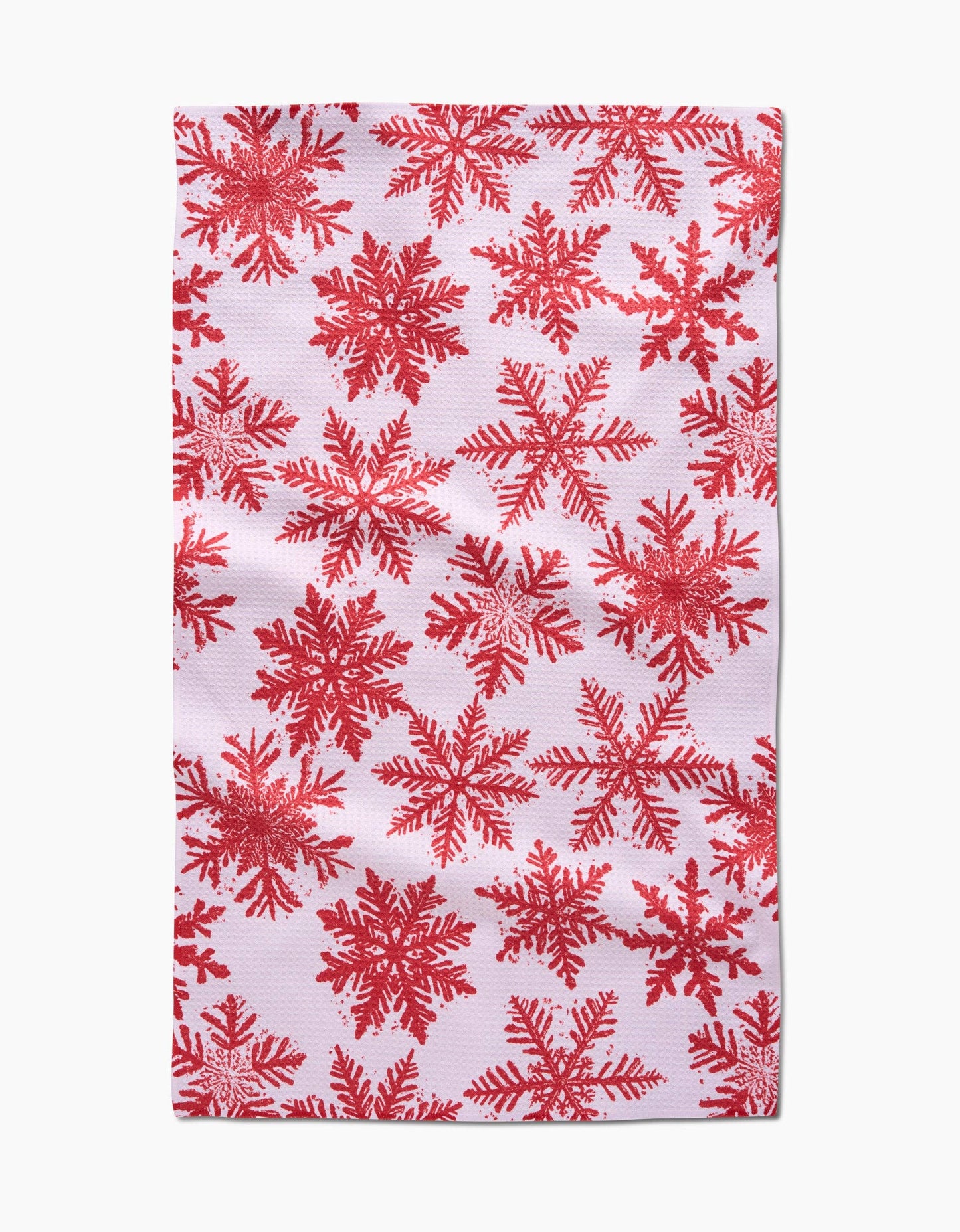 Red snowflake pattern on a white background