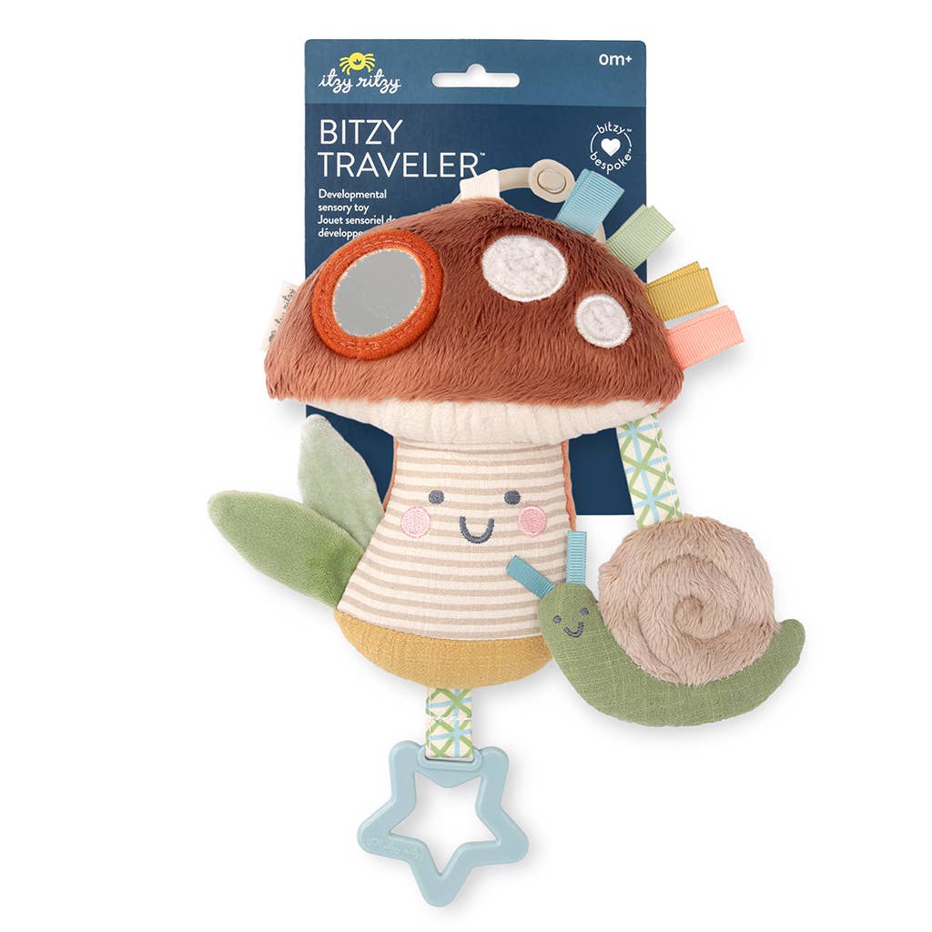 Plush toy with mushroom design and snail, branded 'Itzy Ritzy', on a white background