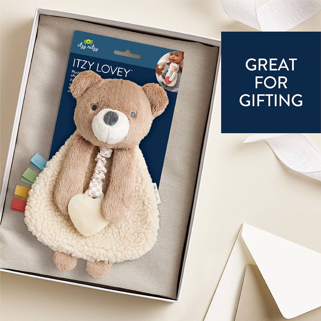 Teddy bear with packaging labeled 'Itzy Lovey' in a box, with text 'Great for gifting'.