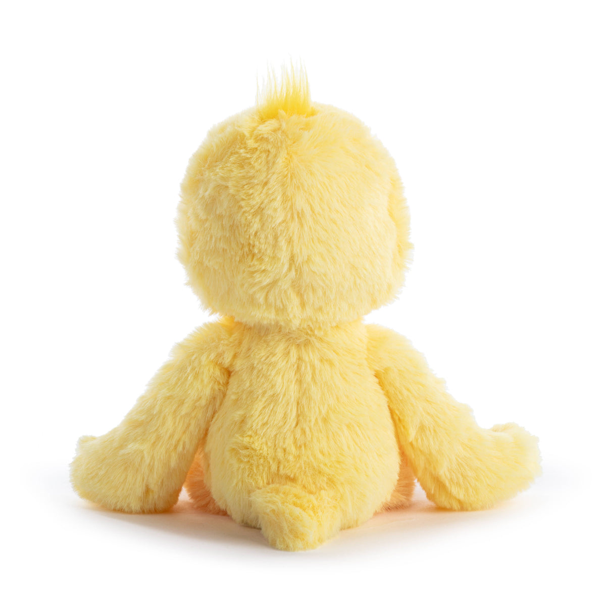 Yellow plush toy on a white background
