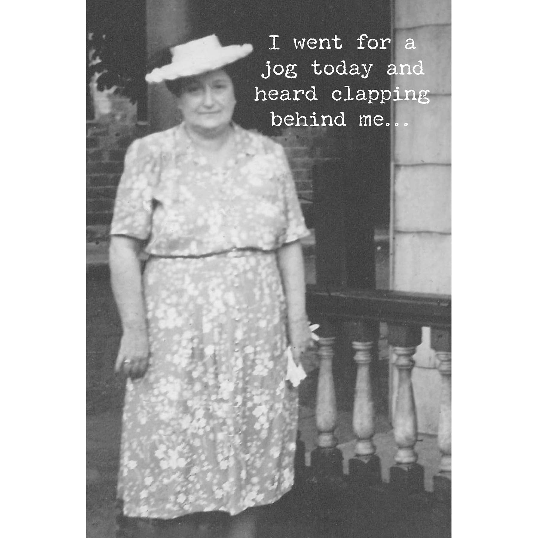 Black and white photo of a woman in a dress and hat with text overlay.