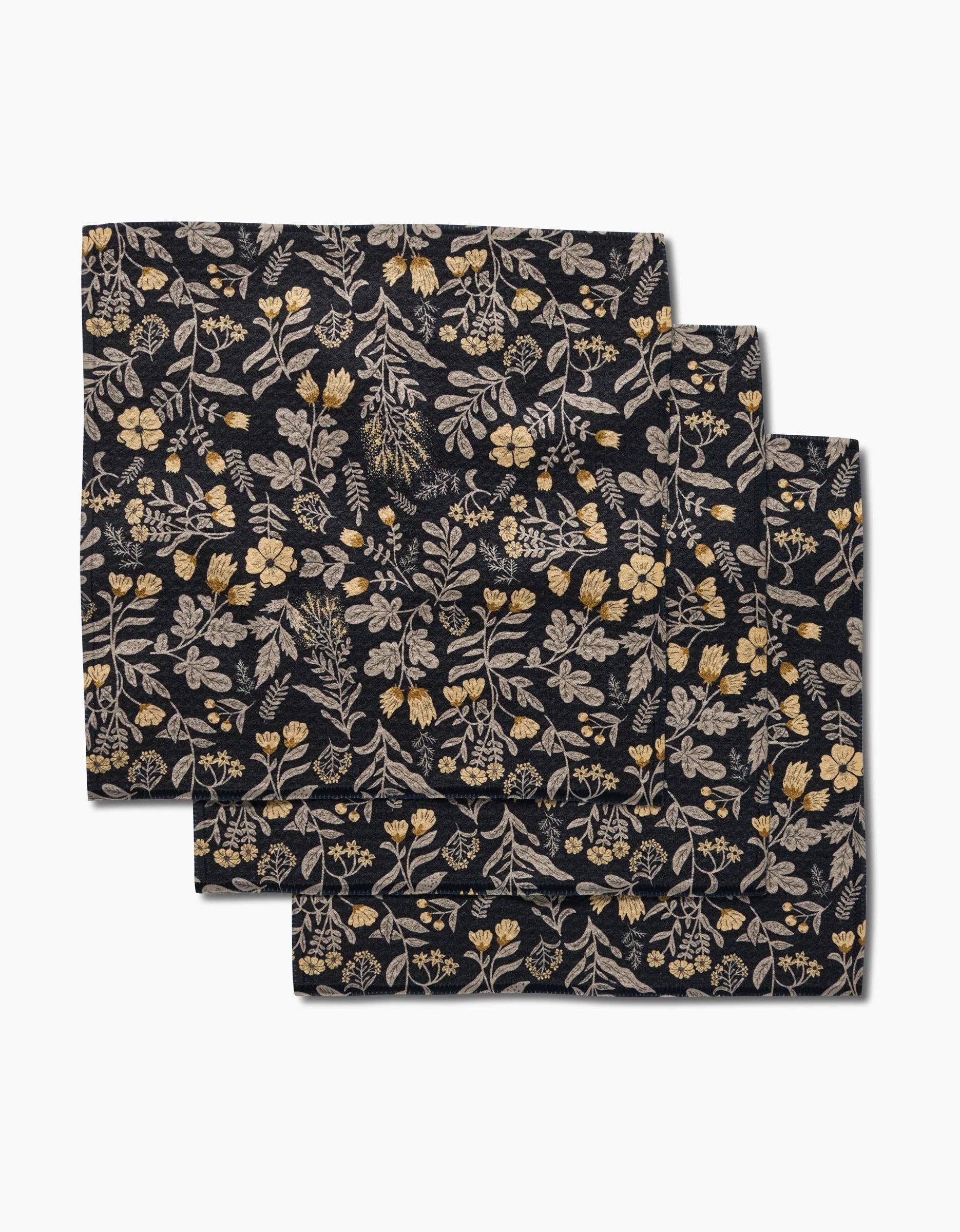 Set of three floral-patterned dishcloths on a white background Geometry Brand