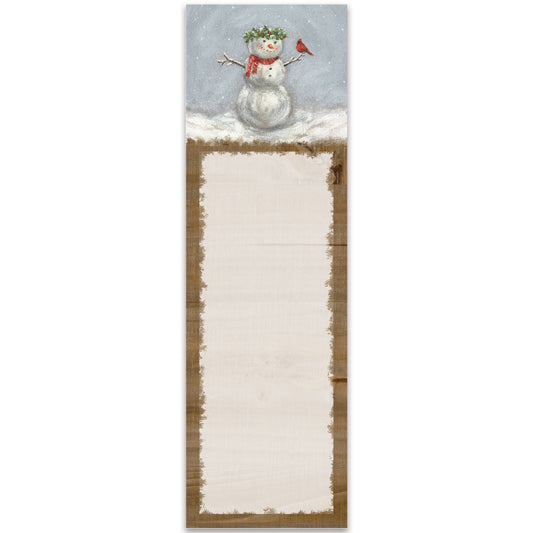 Notepad with a snowman design on the cover