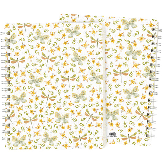 Two notebooks with floral and insect pattern on a white background