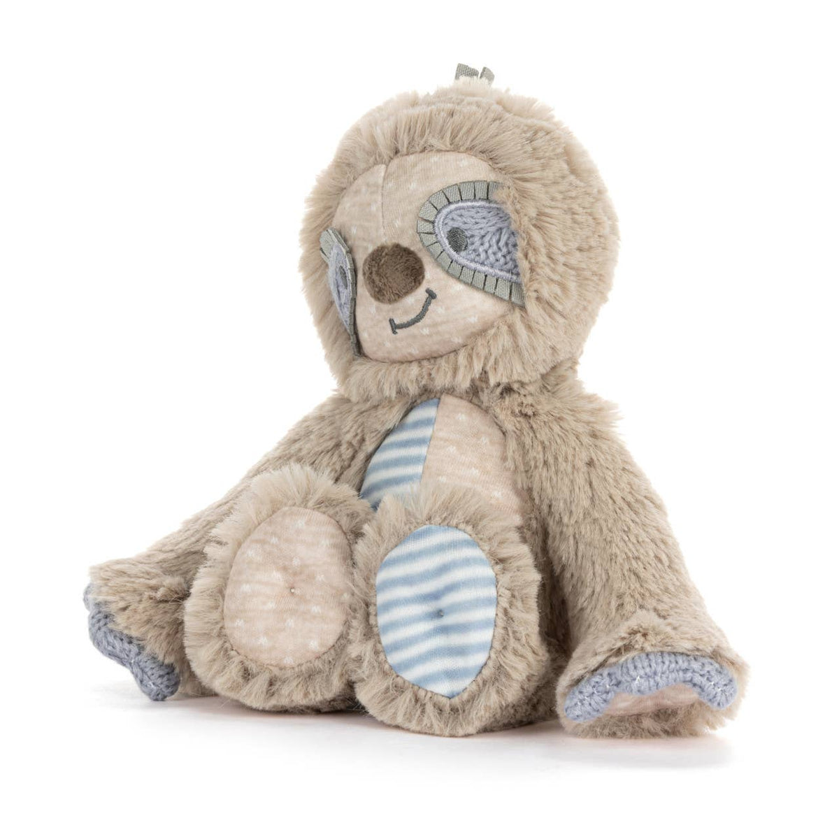 Plush toy sloth with a striped belly on a white background
