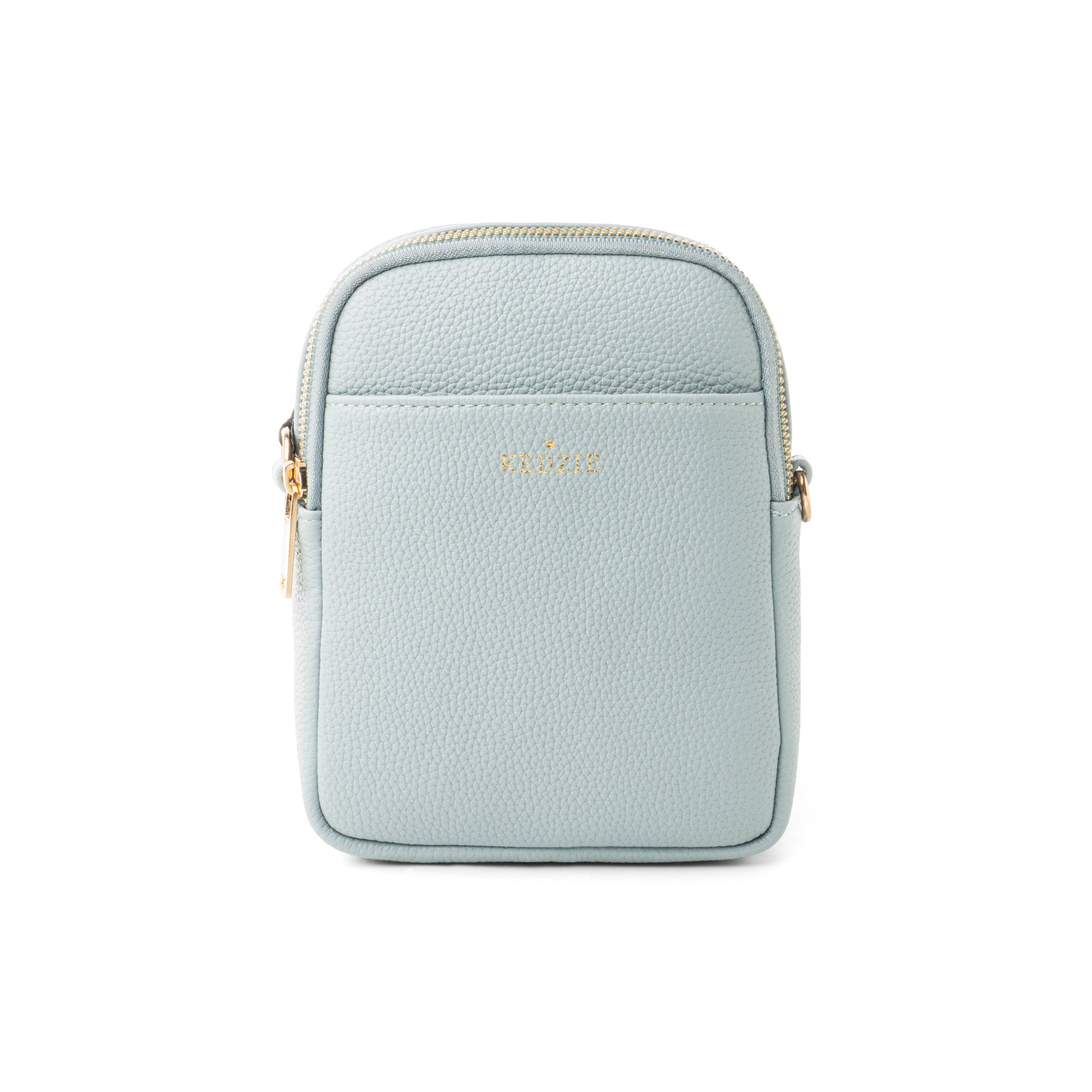 Light blue leather crossbody bag on a white background