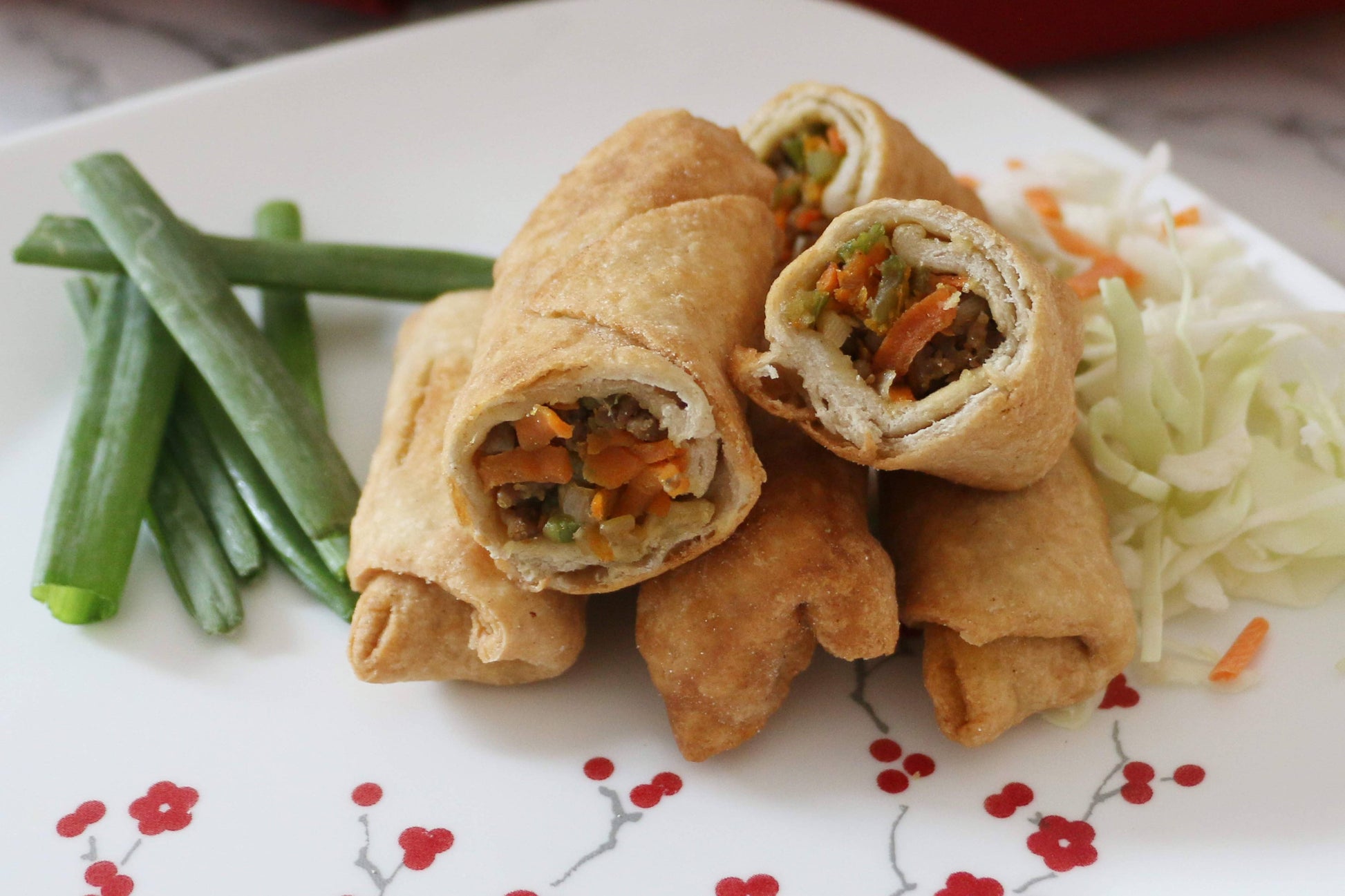 Spring rolls with vegetables on a decorative plate