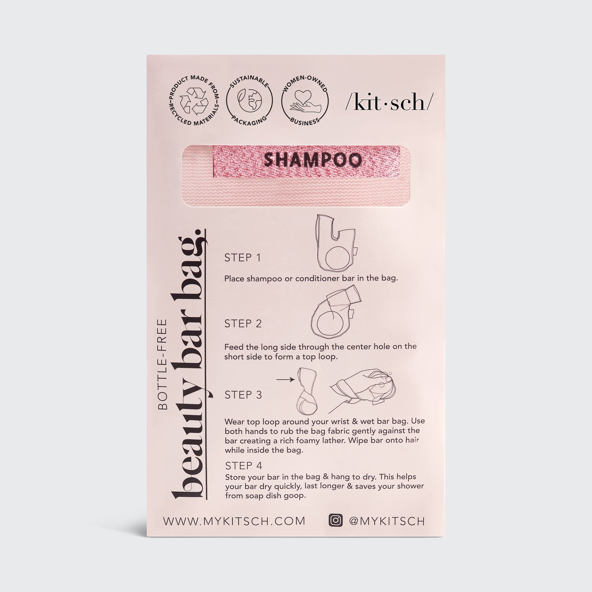 A blush pink mesh fabric shampoo beauty bar bag with a transparent window displaying the product. It is packaged with a product card that has text including the brand name and product description.