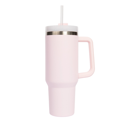 Pink tumbler with a handle and straw on a white background