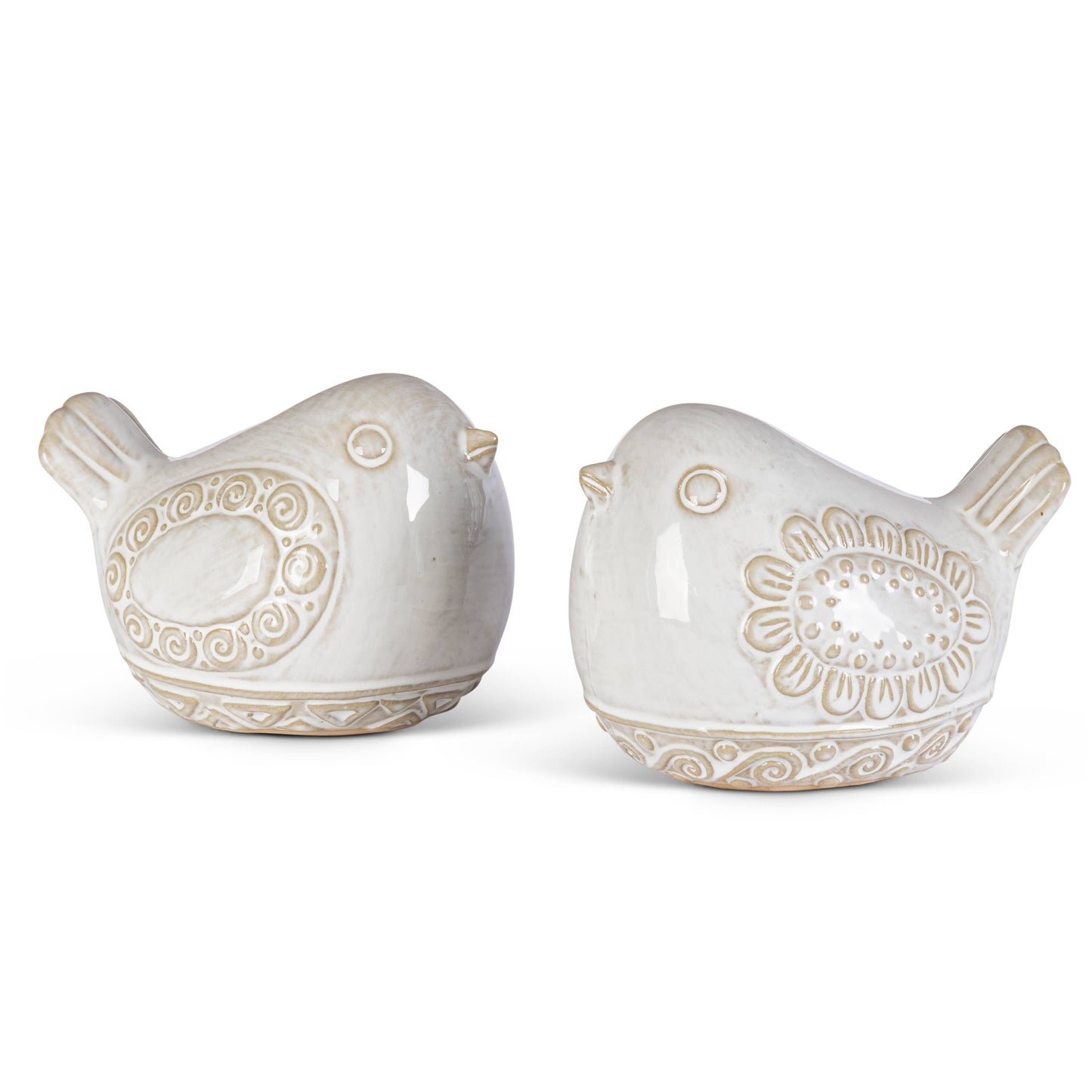 Two white ceramic bird figurines with decorative patterns on a white background
