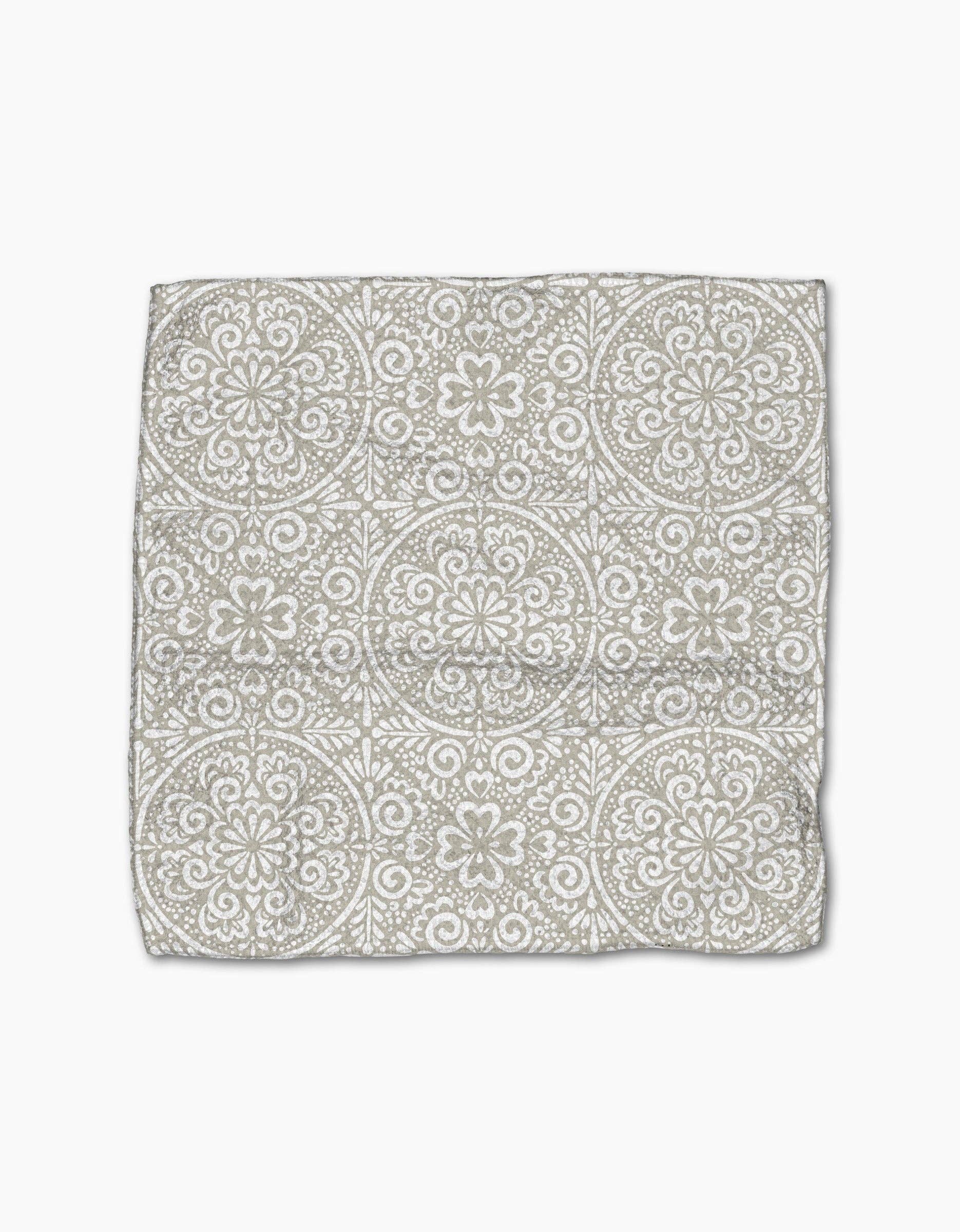 Patterned fabric square on a white background