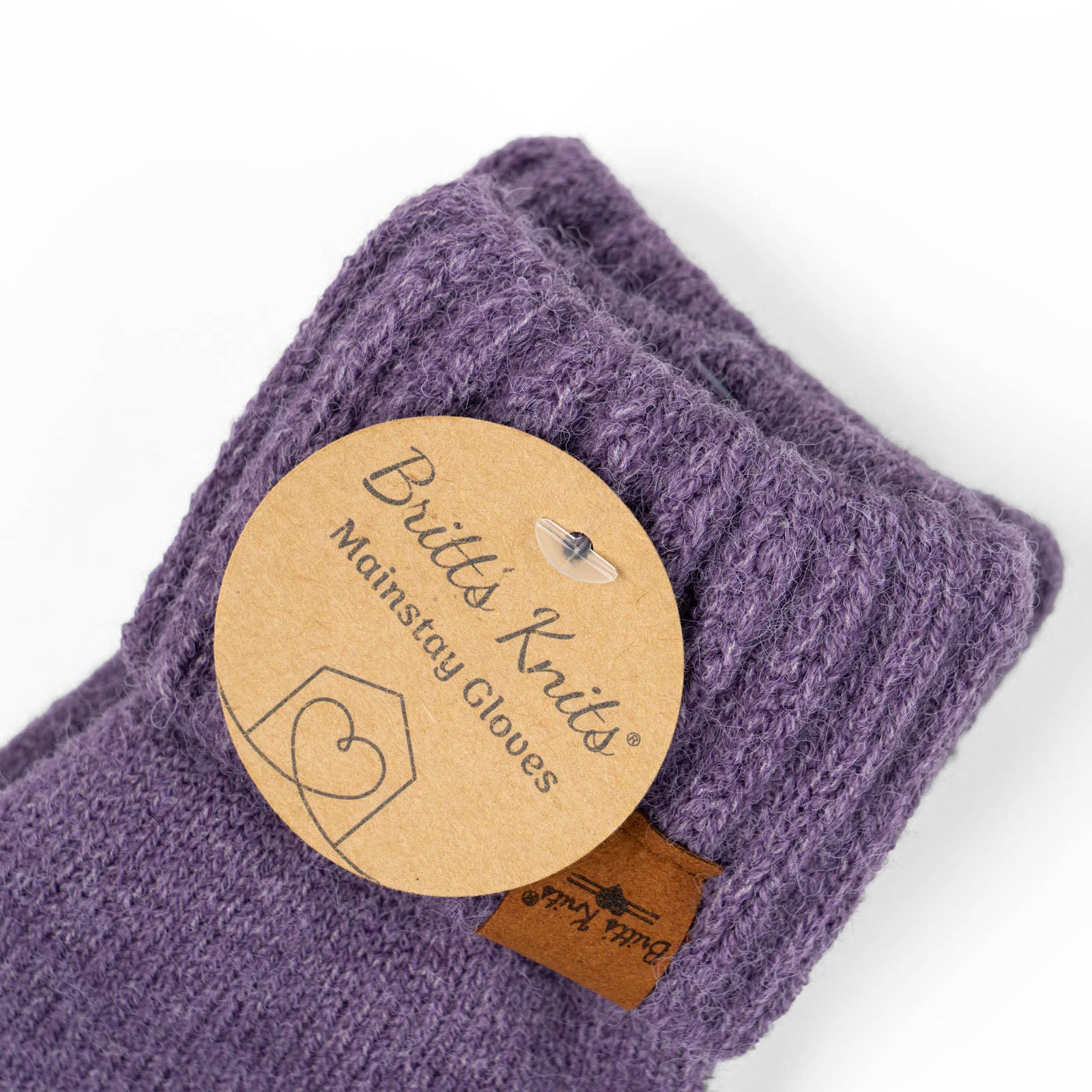 Purple knit gloves with a visible brand label on a white background