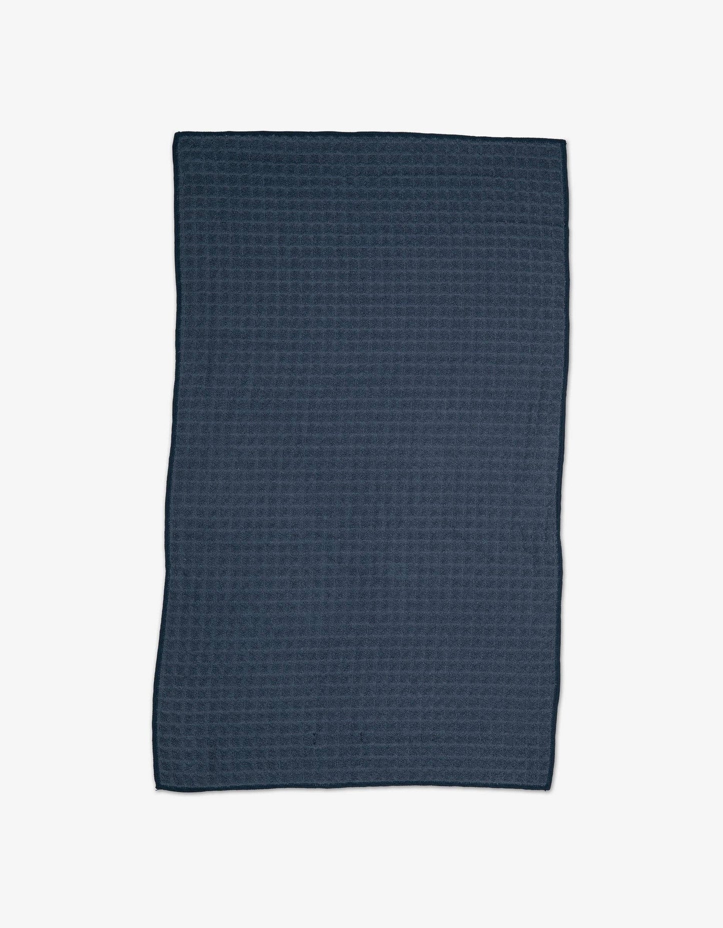 Geometry Waffle Bath Towel Midnight Blue  textured towel on a white background