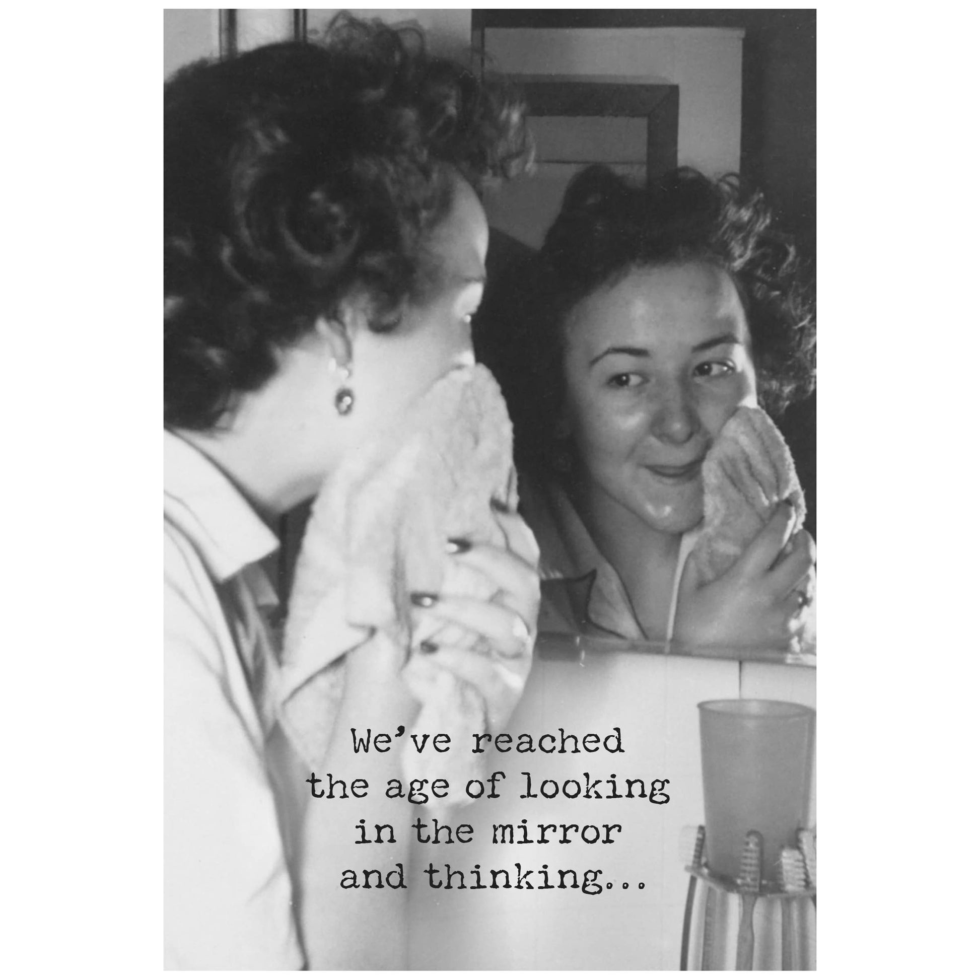 A women looking at herself in a mirror with a text overlay.