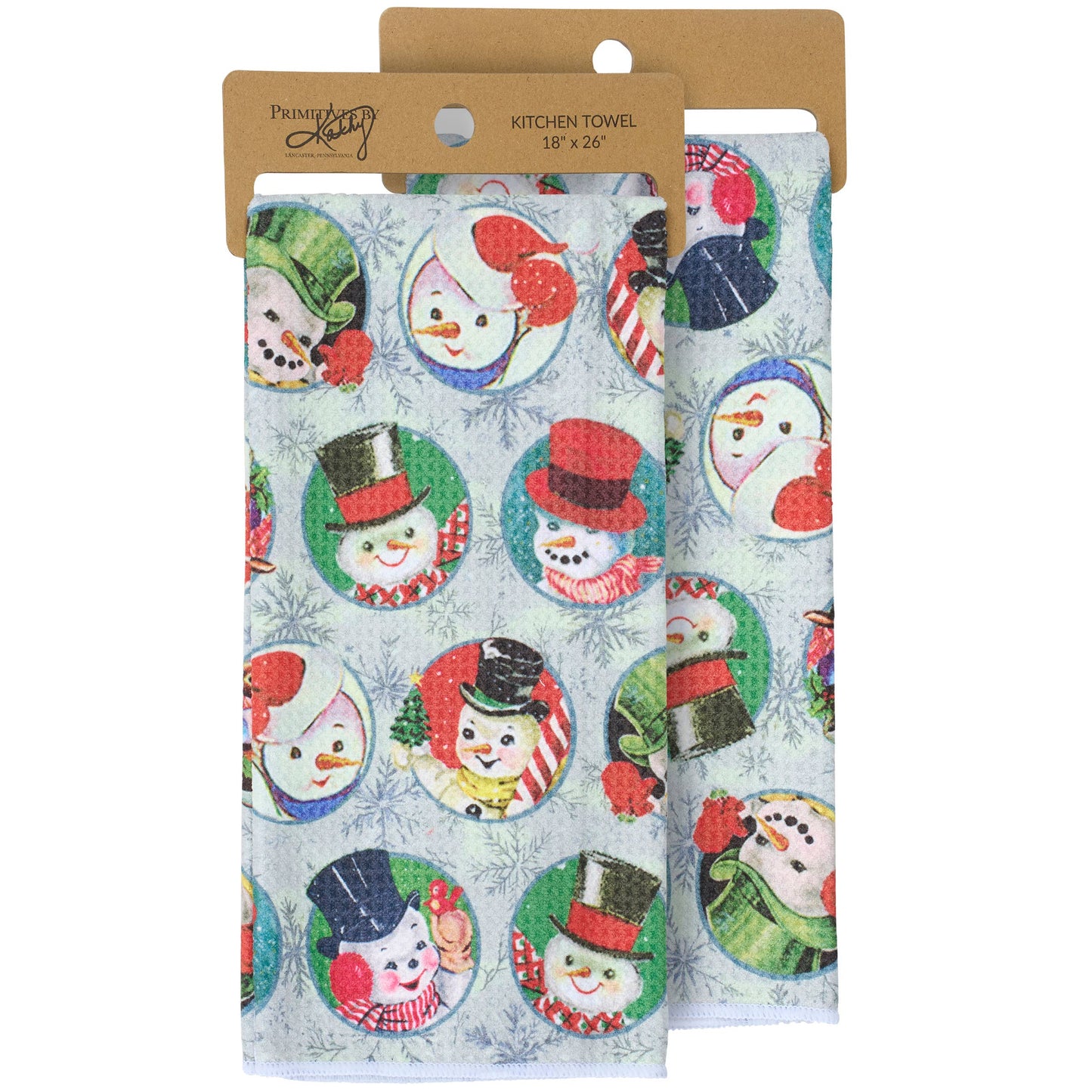 Kitchen towel with snowman design in packaging