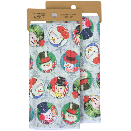 Kitchen towel with snowman design in packaging