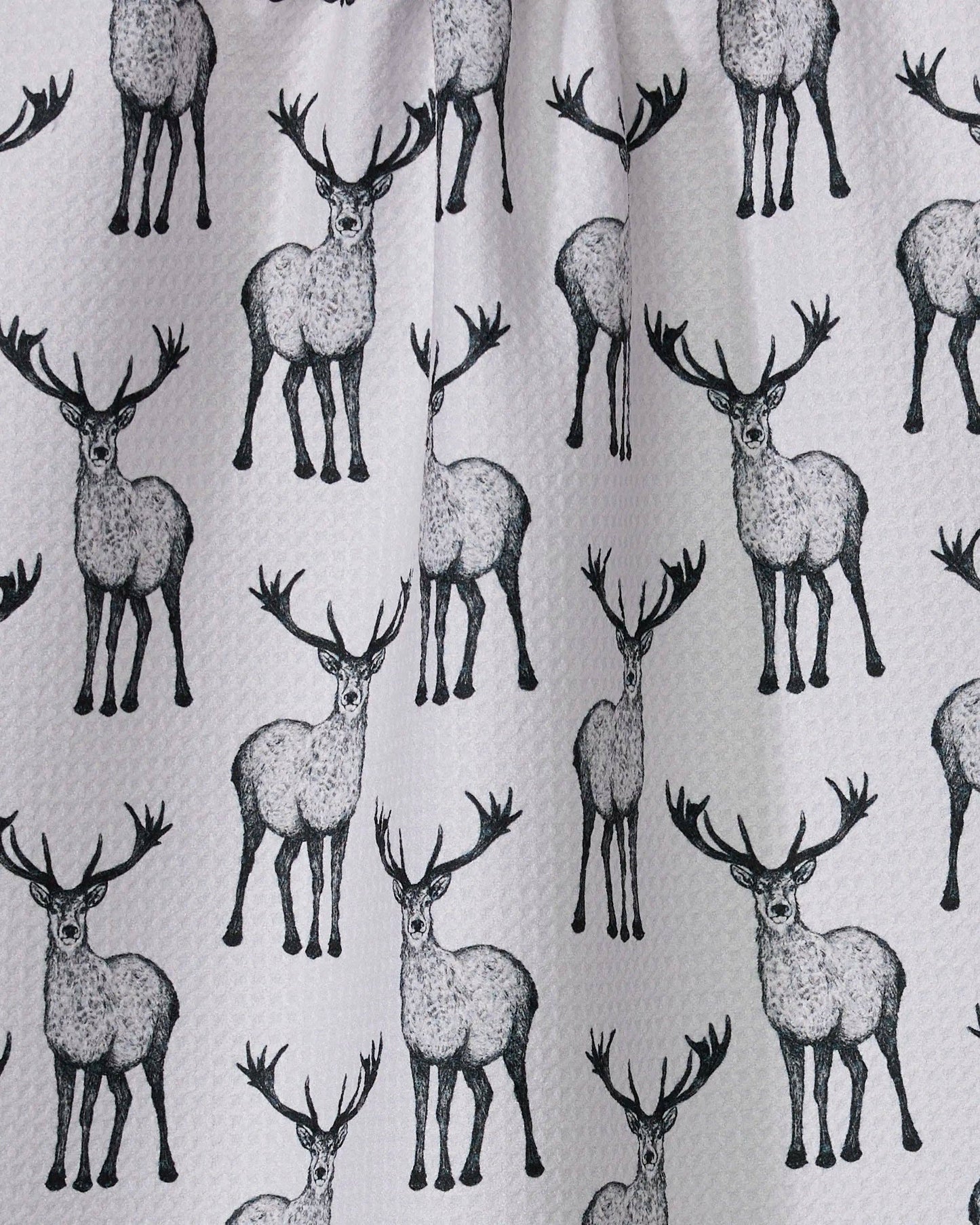 Geometry Tea Towel Pattern of deer illustrations on a light background