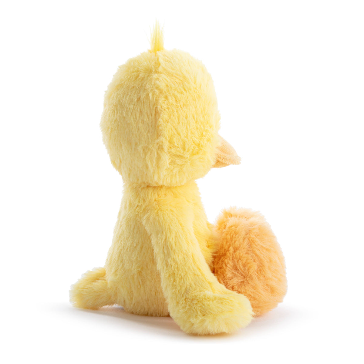 Yellow plush duck toy on a white background