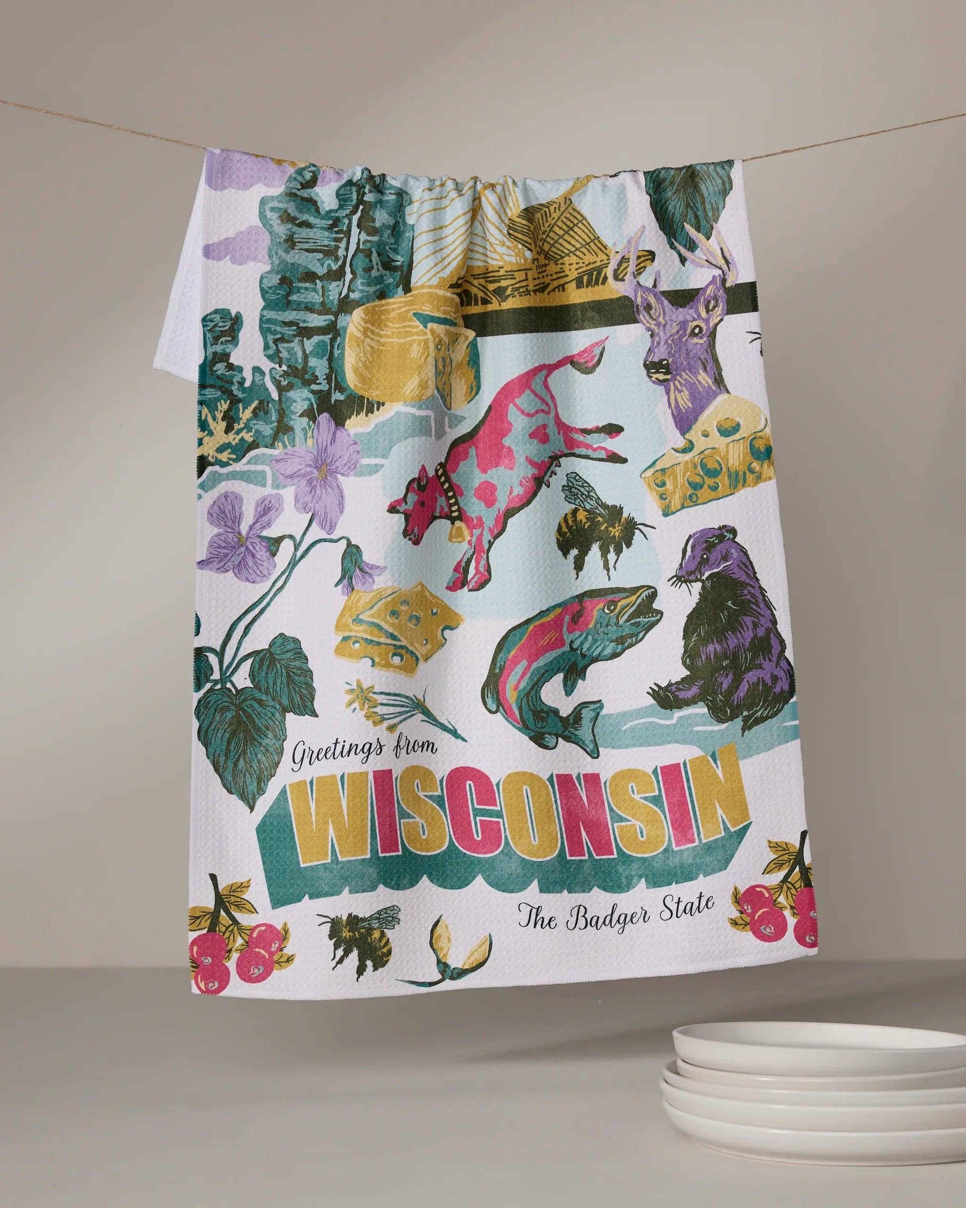 Geometry Tea Towel Decorative towel with Wisconsin-themed design featuring animals and nature elements on a white background.