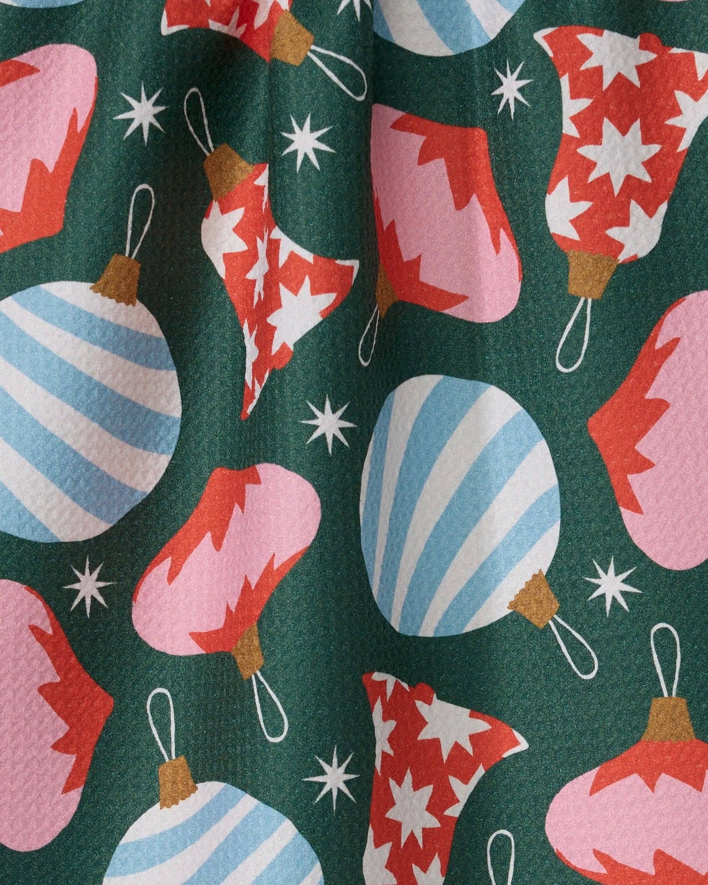 Geometry Tea Towel Pattern of colorful Christmas ornaments on a green background