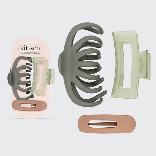 Set of hair clamps with 'kit-sch' packaging on a light gray background