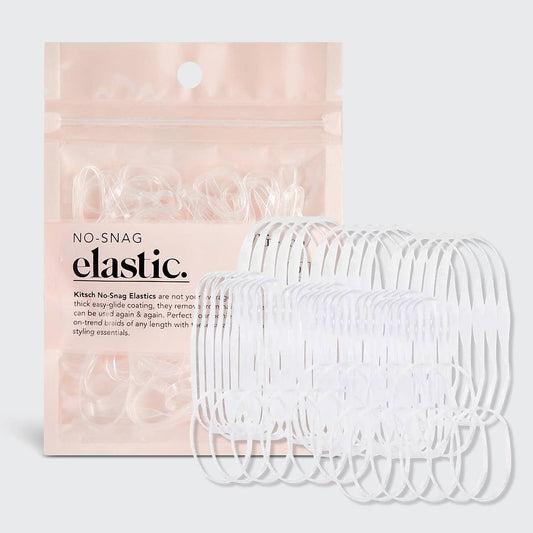Clear hair elastics in front of a pink packaging with 'No-Snag Elastic' text.