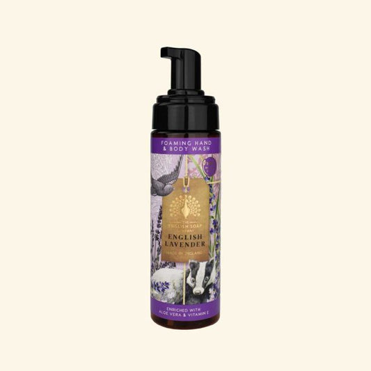 Foaming hand and body wash bottle with lavender design on a beige background