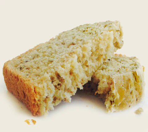 Rosemary Soberdough Beer Bread pieces on white background