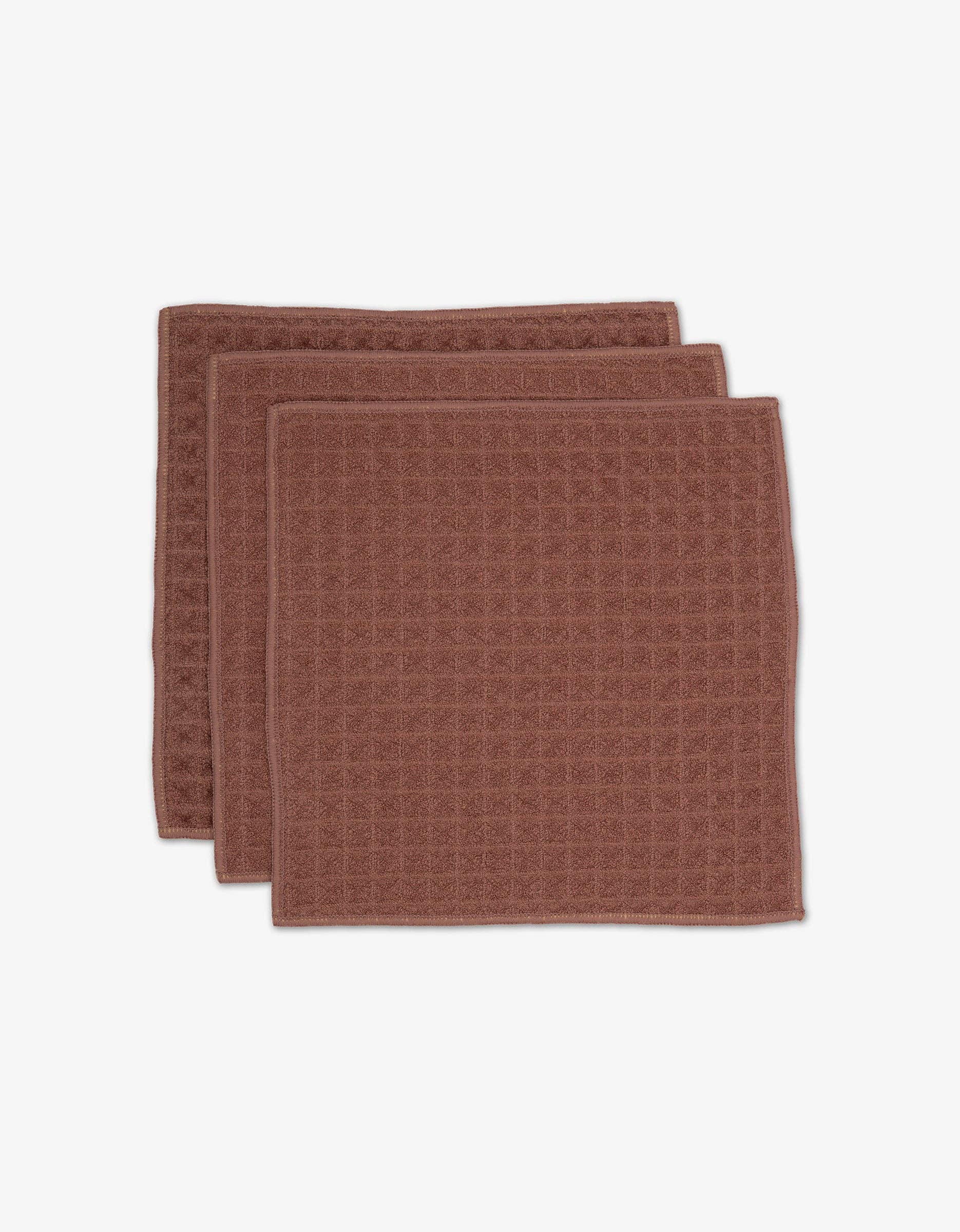 Geometry Waffle Washcloth Set of Two dusty rose textured towels on a white background