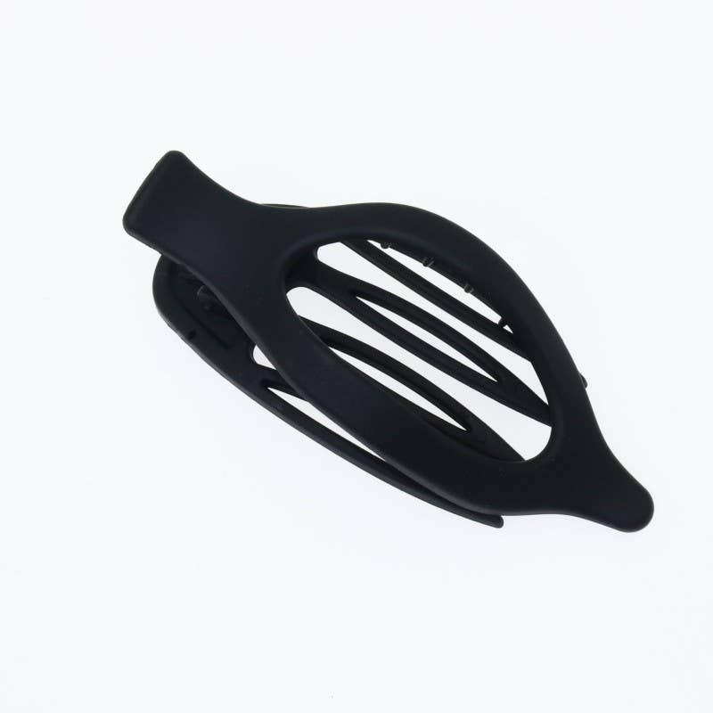 Black hair clip on a white background