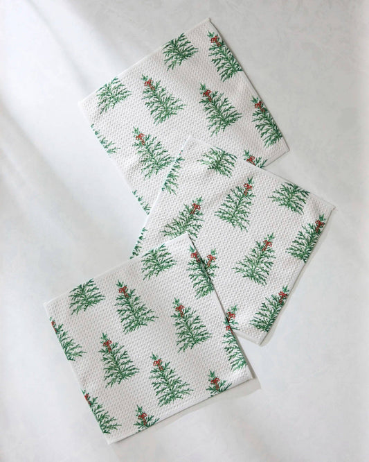 Geometry Dish cloth Set of three white towels with green leaf pattern on a light gray background